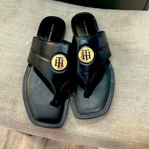Black an gold buckle Tommy hilfger flip flops